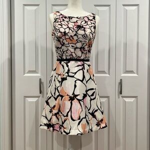 Cocktail dress white with peach and pink flowers.